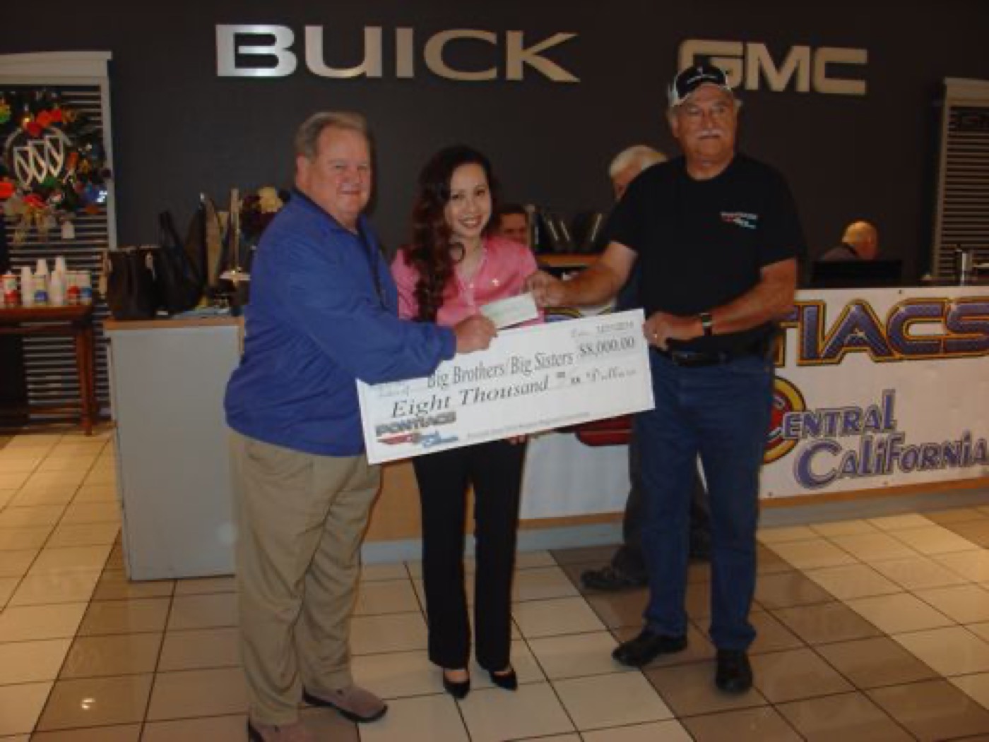 Big Brothers Big Sisters check presented with pride