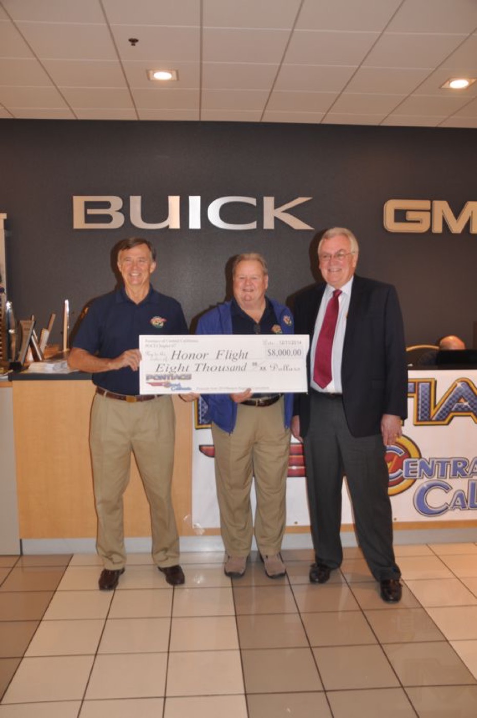 Honor Flight donation check proudly presented together