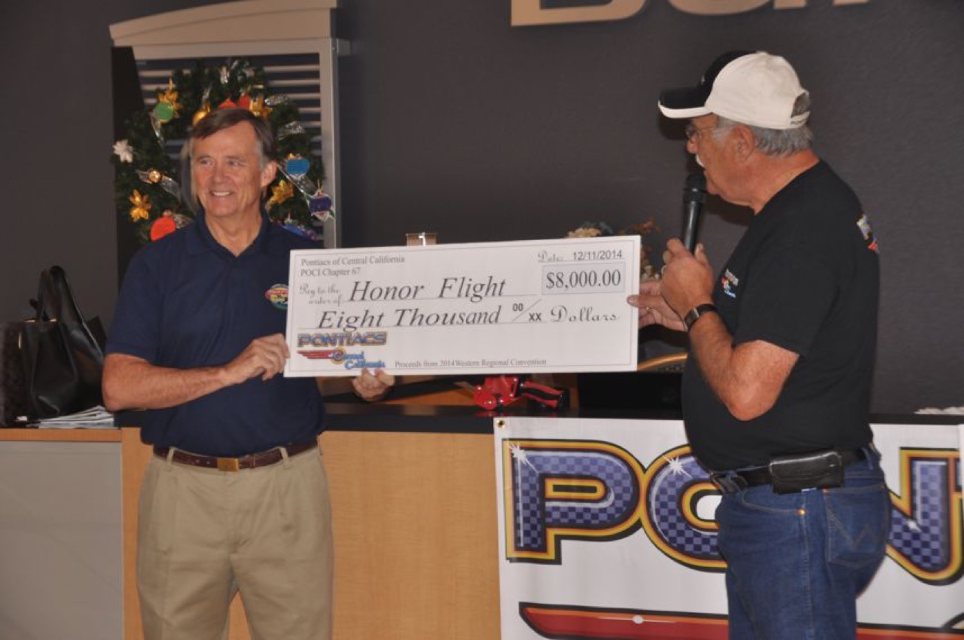 Honor Flight big check handed over with smiles